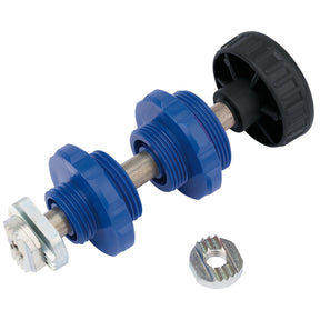 The product is the Draper Tap Reseating Tool, 1/2" And 3/4" - TR210 by Draper, featuring a blue plastic cable gland with dual cable entries and a black tightening knob. It comes with a metal washer and lock nut and includes fit taps to BS1010 for enhanced compatibility.
