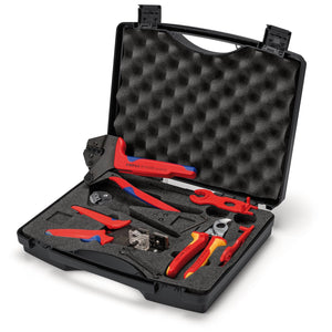 The Draper Knipex 97 91 04 V01 Tool Case for Photovoltaics (for Solar Cable Connectors MC4 - Multi-Contact) includes various red-handled tools, such as Crimp System Pliers, pliers, wire strippers, and a crimping tool, all securely contained within a black carrying case with foam padding.