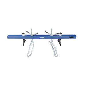 Image of the Draper Engine And Gearbox Support, 500Kg - ES500B in blue, featuring two adjustable black handles, chains, and hooks designed for lifting engine components and aiding in transmission removal. The brand "Draper" is visible on the bar.