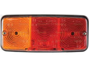 The Sparex Rear Combination Light (Halogen) features three distinct sections: an amber indicator light on the left, a white light in the center, and a red brake/tail light on the right. This left-hand (LH) 12/24V light serves multiple functions including brake, tail, and indicator lighting. The Sparex Part Number is S.138005.