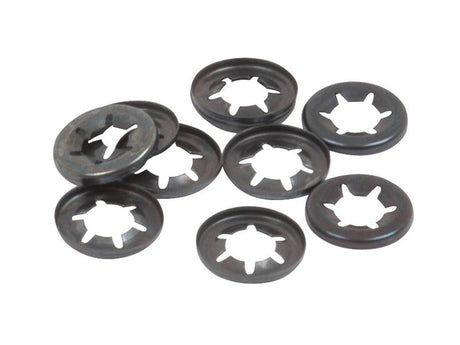 A collection of metal push nuts, including some 1/8" Sparex Imperial Starlock Washers from Sparex NLA, spread out on a white surface.