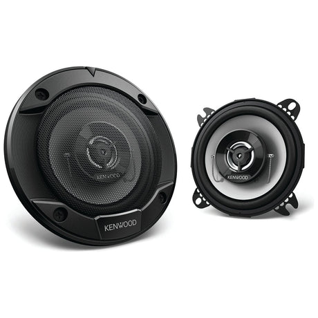 A pair of black JMCE car audio speakers, one positioned face forward and the other at a slight angle, showcasing their detailed design with 10cm Polypropylene Woofers and robust construction capable of delivering 220W Peak Power (*SPECIAL PRICE* - 10cm Flush Mount Speaker - S.147876).