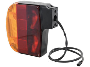 Close-up of a vehicle tail light featuring the Sparex Rear Combination Light (Halogen), offering integrated Brake, Tail, and Indicator functions. It includes a plastic casing, wired connection with a connector plug, and an IP54 Rating. This right-hand light is compatible with both 12V and 24V systems and fits as part number 47129205 (Sparex Part Number: S.151535).