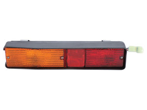 The Rear Combination Light by Sparex, model S.160717, is a right-hand halogen taillight assembly that includes amber, red, and clear lenses on a sleek black casing with 12V functionality for brake, tail, and indicator lights.