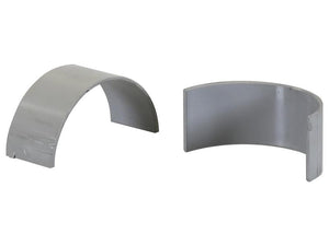 Two gray, semi-circular metal objects are displayed side by side. One is closed on both sides, while the other is open on one side. This pair, known as the Conrod Bearing Standard Pair (Sparex Part Number: S.163326), exemplifies Sparex's precision and durability to their standard dimensions.