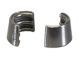 A pair of small, metallic, semi-circular valve collets with inner grooves, compatible with Deutz-Fahr AGROTRON engines from the Sparex brand, featuring Sparex Part No. S.163338.