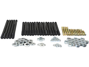 A collection of various bolts, nuts, and washers from the Sparex Cylinder Head Stud Kit arranged in groups on a white surface, compatible with Ford / New Holland equipment.