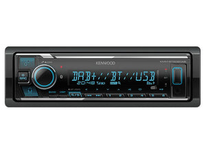 Front view of a Sparex car stereo system with illuminated buttons and display, showing options for DAB, Bluetooth, and USB. Product name "Radio - Alexa | DAB | Bluetooth | Mechless | Short Body | Aux In" with Sparex Part Number S.163749 is visible on the top right.