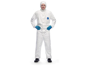 A person wearing a DuPont Tyvek 500 Xpert full-body protective suit in white (Sparex Part Number: S.164214), along with blue gloves, black shoes, and a hood, stands against a plain white background with hands on hips. The suit meets CAT III and Type 5B standards for optimal protection.