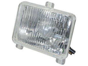 Introducing the Sparex Head Light (Sparex Part Number: S.169070), a rectangular automotive headlight featuring a clear lens and a sleek black electrical connector at the back. It offers an excellent alternative for your vehicle needs and ensures seamless integration with Sparex components.