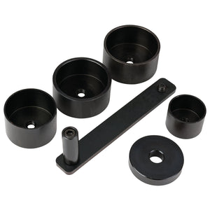 The Draper Engine Timing Kit (ETK210) in black metal, comprising various cylindrical cups, a bar with an attached pin, and a flat circular piece, is perfect for maintaining your Suzuki Grand Vitara.