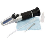 The Draper Expert Adblue® Refractometer Kit - ARFR by Draper includes a handheld refractometer with an eyepiece, a blue cloth, a plastic pipette, a metal tool, and a small plastic container for measuring urea concentration.