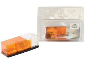 Two Front Combination Lights (Halogen), each designed for 12/24V and labeled with Sparex Part Number S.23346, are shown. One light, featuring an Amber/Clear Lens with distinct orange and clear segments, is displayed outside its packaging. The other remains sealed in a clear plastic blister with its identifying label attached.