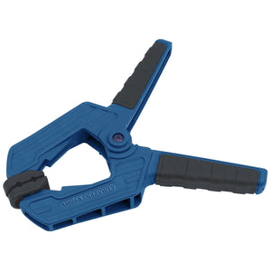 A Draper Soft Grip Spring Clamp, 50mm Capacity - D209, with blue plastic body, black rubber handle grips, and swivelling jaw ends is shown against a white background.