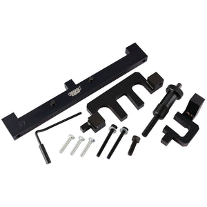 A set of Draper automotive tools, the Engine Timing Kit ETK134 for BMW, including a black bracket, bolts, screws, a hex key, and various specialized components like camshaft locking tools and Vanos sensor alignment tools, all arranged on a white background.