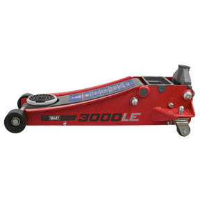 Introducing the Sealey Trolley Jack 3tonne Low Profile Rocket Lift Red - 3000LE, featuring a durable steel chassis, carrying handle, and a convenient lifting pad. The efficient twin piston rocket lift and low profile lifting range make it versatile for various applications.