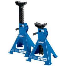 Two Draper Ratcheting Axle Stands, each with an impressive 2-tonne capacity, feature adjustable heights, sturdy metal bases, and large saddles designed for lifting and supporting vehicles effortlessly.