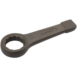 A Draper Ring Slogging Wrench, measuring 50mm to 120mm and made from durable carbon steel, features a circular closed end for gripping nuts and bolts. The handle is engraved with "Draper" and the wrench complies with DIN7444 Specifications.