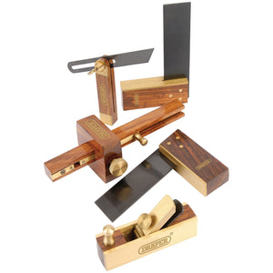 The Draper Mini Woodwork Set (5 Piece) - MWWSET includes a collection of wood and solid brass woodworking tools such as a square, marking gauge, dovetail marker, bevel gauge, and small plane. Each tool features a precision-machined steel blade for accuracy. For convenience, the set comes with a portable storage pouch for easy transport.