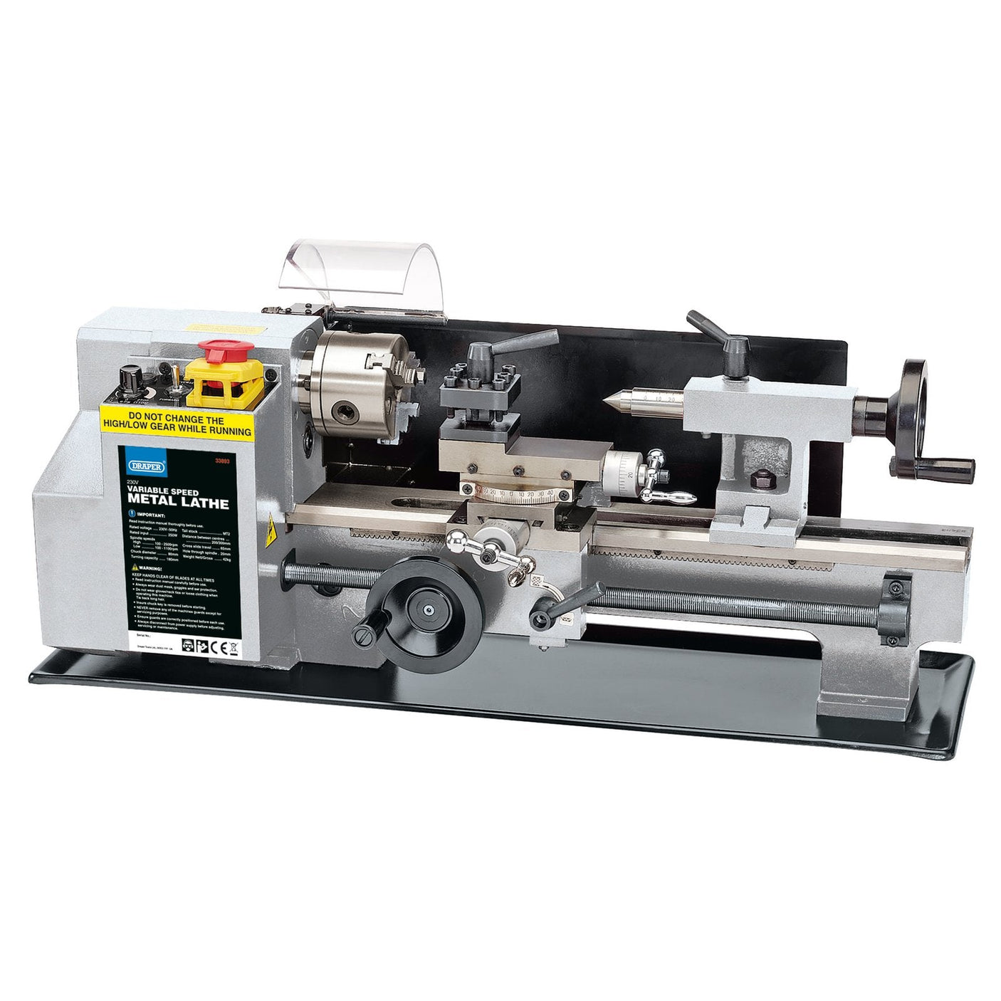 Image of the Draper Variable Speed Metal Work Lathe, 250W - LATHE-300, featuring various knobs, dials, and a chuck. This lathe is equipped with variable speed control and metric gears for precision metalworking and machining tasks.