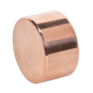 A cylindrical piece of polished copper, posing on its circular face against a white background, reminiscent of the Sealey Copper Hammer Face for CFH04 & CRF35 - 342/314C, ideal for Premier Hand Tools and professional use.