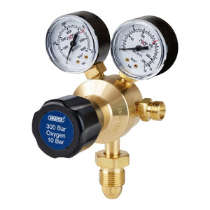 The Draper Oxygen Regulator, 300 Bar - W702 is a single stage brass oxygen regulator with BSP inlet connections, equipped with two pressure gauges indicating 300 bar and 10 bar, and features a black adjustment knob labeled "300 Bar Oxygen 10 Bar.