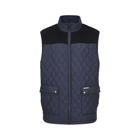 The Cottonmount Country Estate Arundel Quilted Bodywarmer Navy is a stylish navy blue vest with a black yoke, featuring a stand collar, snap button pockets, and a front zipper closure. Perfect for outdoor workwear or leisurewear, it also includes a cozy fleece lining for added comfort.