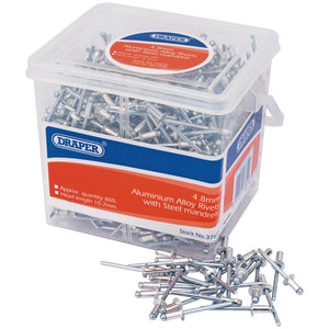 A clear plastic container labeled "Draper Blind Rivets, 4.8 X 10.2mm (Tub Of 800) - RIV/TUB" contains approximately 800 aluminum rivets with steel mandrels. Some rivets are scattered outside the box.