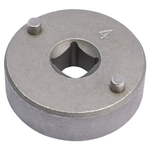 The Draper Renault Clio Brake Piston Wind-Back Tool - CWBT is a round carbon steel tool featuring a central square hole and two small cylindrical pins on the top surface, making it ideal for working on Renault Clio calipers.