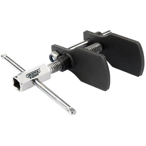 The Draper Piston Retraction Tool, 1/2" Sq. Dr. - CWT2A, a product from the renowned brand Draper, is expertly designed for brake calipers without wind-back mechanisms. This tool features a silver main body with a T-handle and black spreading plates to facilitate easy and parallel piston retraction.