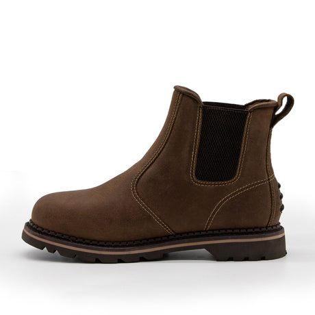 A single brown leather Chelsea boot with a dark elastic side panel, rugged nitrile rubber sole, and pull tab at the heel, viewed from the side. This Cottonmount Xpert Heritage Boulder Non-Safety Boot Brown features Goodyear welting for added durability and long-lasting wear.