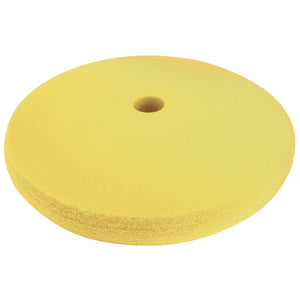 The Draper Polishing Sponge - Heavy Cut, 180mm - APT121 is a round, yellow foam buffing pad featuring a hole in the center and a hook and loop fixing, ideal for 180mm angle polishers, displayed on a white background.