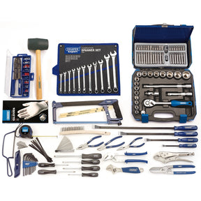 A comprehensive Draper Workshop Tool Kit (A) - DTKTKC2A is displayed, featuring wrenches, screwdrivers, pliers, sockets, a hammer, a hacksaw, and various other hand tools—all neatly arranged in organized rows. Perfect for any workshop.