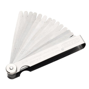 The Draper 32 Blade Combination Feeler Gauge Set - 4620B by Draper consists of multiple thin, dual-marked blades fanned out, with each blade labeled with its thickness measurement, housed in a plated steel case.