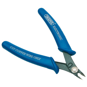 Close-up of the Draper Electronic Flush Cut Nipper, 130mm - 31A, featuring blue handles labeled "CUT COPPER WIRE ONLY" on one side and "DRAPER ELECTRONIC" on the other. The nipper is equipped with carbon steel blades and soft grips for enhanced comfort.