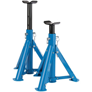 Two Draper AS2000F Folding Axle Stands, each with a 2-tonne capacity, come in blue and feature heavy-duty construction. Designed for vehicle support during maintenance or repair, these stands include steel locking pins, a wide base for increased stability, and black adjustable top posts.