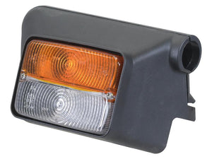 A rectangular Sparex Front Combination Light (Halogen) with amber and clear lenses, mounted in a black plastic housing for the left-hand side of a vehicle, operating at 12V.