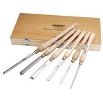 The Draper Hss Woodturning Chisel Set (6 Piece) - AWL44, including a Roughing Gouge and Bowl Gouge with wooden handles, is displayed in front of a closed wooden storage box labeled "6 Piece Woodturning Chisel Set" by Draper.