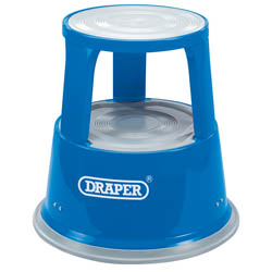 The Draper Metal Kickstool - KS is a two-step, cylindrical blue step stool featuring gray treads on both the steps and platform. Labeled with the "Draper" brand, it includes castor wheels for easy mobility and has a handle opening at the top.