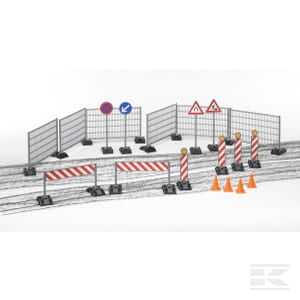 The construction site on the road is furnished with metal fences, warning signs, and plastic traffic cones from the Bruder Building Site Set - U62007. Barricades are systematically arranged to direct traffic and indicate caution. This setup aligns with a 1:16 scale division, making it suitable for children aged 3 and up.