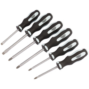 The Draper Expert Pound Thru Soft Grip Screwdriver Set (6 Piece) - 996/S6 includes six screwdrivers with black and white soft grip handles, featuring a combination of flathead and Phillips head types with hardened blades, all arranged in a row.