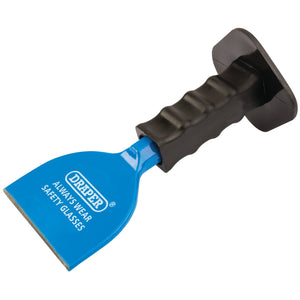 The Draper Brick Bolster With Hand Guard, 225 x 100mm (BD6G/A), features a blue metal blade and a black rubber impact protection grip. It is labeled with "DRAPER" and "ALWAYS WEAR SAFETY GLASSES," making it perfect for cutting bricks or composite blocks.