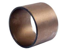 A Spindle Bush (Sparex Part No. S.65075) by Sparex, is a copper-colored cylindrical bushing with smooth interior and exterior surfaces, designed for mechanical applications such as the front axle sleeve of an International Harvester.
