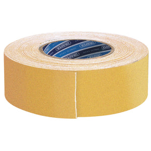 A roll of yellow, heavy-duty safety grip tape, ideal for outdoor surfaces, branded "Draper" on the TP-S/GRIP/Y model.