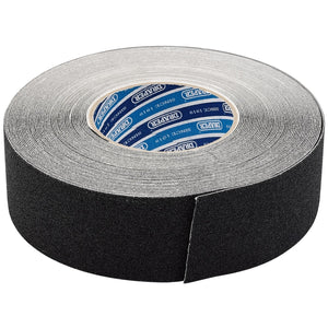 The Draper Heavy Duty Safety Grip Tape Roll, TP-S/GRIP, measuring 18 meters by 50mm in black, features a self-adhesive design with visible text on the inner core.