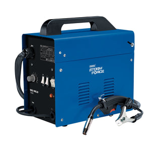 A blue Draper Storm Force® Gasless MIG Welder, model 150A - MW150A/SF, featuring a black carrying handle, control knobs with adjustable power settings, a power switch, and cables. The welding gun and ground clamp are conveniently attached at the front.