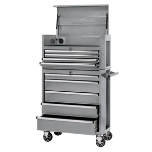 The Draper Expert Combined Roller Cabinet And Tool Chest, 9 Drawer, 36" - DTKTC4C/RC5C is a metallic silver tool chest featuring multiple drawers and compartments, with some open. It stands on wheels and has an open top compartment that reveals additional storage space.