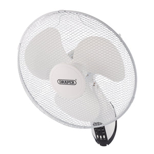 The Draper 230V Oscillating Wall Mounted Fan With Remote Control, featuring a white wire mesh cover and three oscillating blades inside, prominently displays the "Draper" brand name at the center.