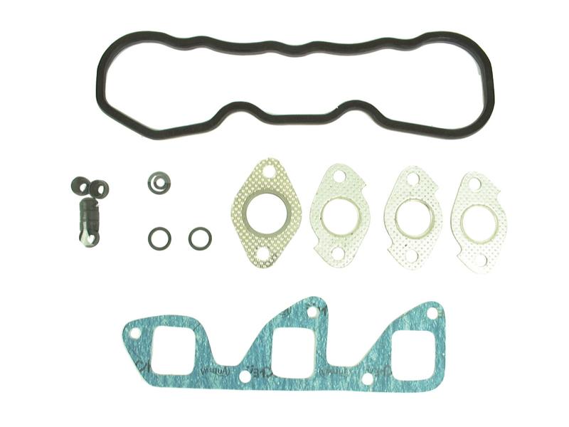 A set of Sparex Top Gasket Set - 3 Cyl. (Sparex Part No.S.71904) components laid out on a white background, featuring a valve cover gasket, intake manifold gasket, and three smaller gaskets for 3 Cylinder engines, alongside several O-rings and bolts.