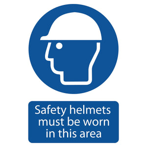 The Draper Safety Helmet Must Be Worn - SS48 sign, by Draper, features a blue safety design with a white head in a helmet icon and the printed message: "Safety helmets must be worn in this area," utilizing UV resistant ink.